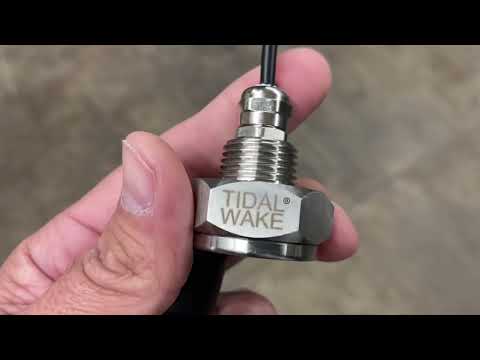 Installing an underwater LED boat drain plug.