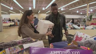 New in Town: Jason Mikell and Laura Caso shop for deals at Krazy Bins in Parma