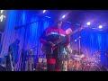 Angelo Moore in the crowd playing with fishbone at the Grammy museum.