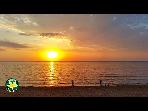 Mer calme et bruit relaxant des vagues à l'aube