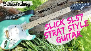 Video thumbnail for SLICK SL57 STRAT STYLE GUITAR UNBOXING-BEST GUITAR UNDER $300? MIGHT BE!!!!! by Addicted 2 Guitar