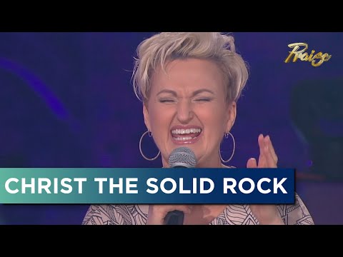 On Christ the Solid ROCK...I Stand!