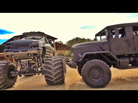 Military Truck Takes On A Monster Truck In A Epic Game Of Tug Of War