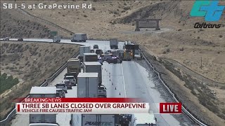 Three SB lanes closed over Grapevine causing a traffic jam