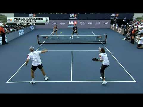 Ben Johns and Etta Wright dig out an offensive barrage by Lea Jansen and James Ignatowich