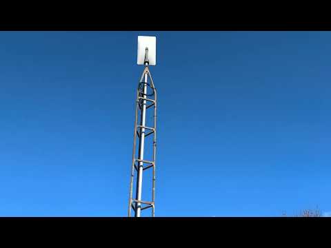 Starlink Pole Adapter Install on antenna tower. I show how the cable is run through the adapter.
