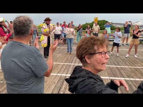 Greater Kensington string band on the Ocean City boardwalk play take me out to the ball game￼