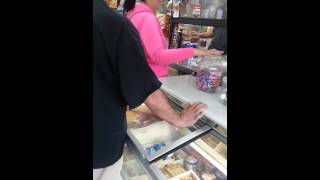 Asian store clerk loses him mind when confronted with illegal activity!