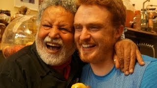 Happiest Man in Israel (Uzi-Eli Hezi Etrog Healer) laughing and massaging in Jerusalem עוזי-אלי חזי