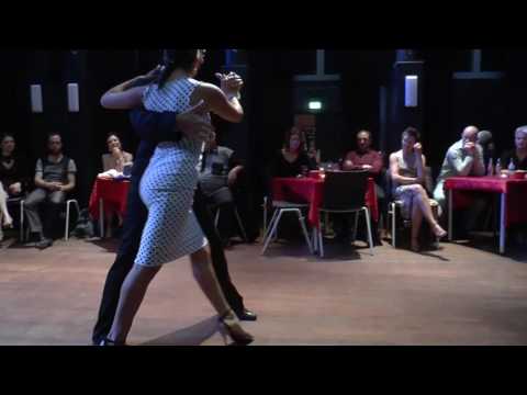  Samantha Dispari  and  Santiago Fina  are  dancing  to  "  Quedemonos Aqui  "  by  Juan D'Arienzo