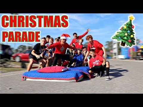 BED SURFING IN CHRISTMAS PARADE WITH FANS!