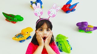 Ashu Playing with Pull Back Toy Dinosaurs - Kids Toys by Lukat