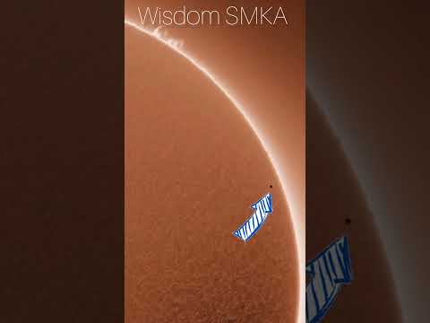 The little dot in front of the sun is actually Mercury