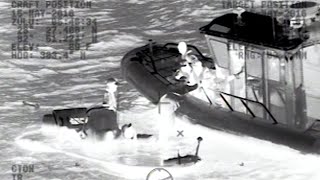 Coast Guard rescues two kids and two adults from sinking boat