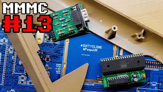 A smashed C64, a C128 to SCART adapter, a W65C02S to 6502 adapter and a replica C64