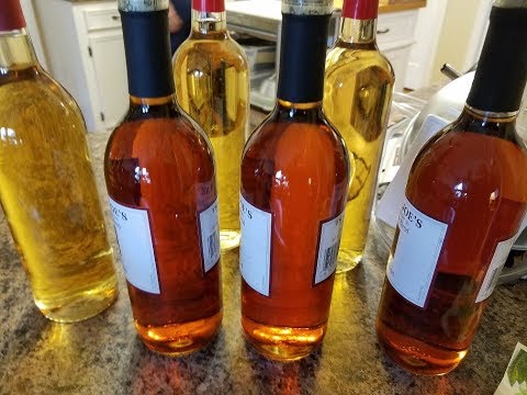 PHIL'S HOMEMADE WINE | PART 2 | RACKING CLEARING FILTERING CORKING | MUSCADINE WINE