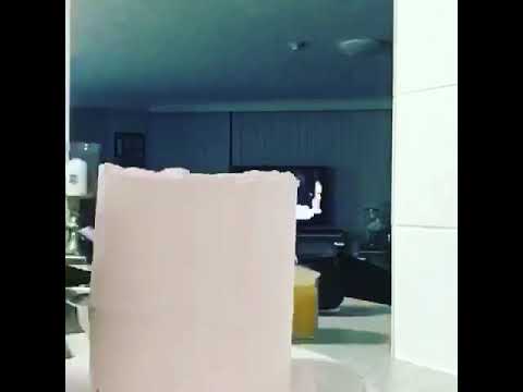 Creaming a four layer sponge cake