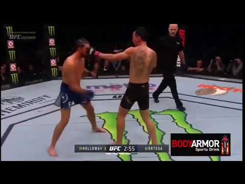 Max Holloway teaching Brian Ortega to block punches mid fight