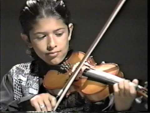 Young Quetzal Guerrero playing violin