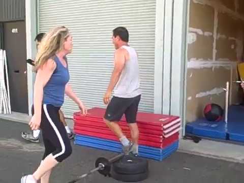 Kerry C and Sarah F in the last round of Fight Gone Bad at FGB III at CrossFit Marin