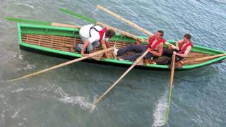 Racing currachs off Inis Meain