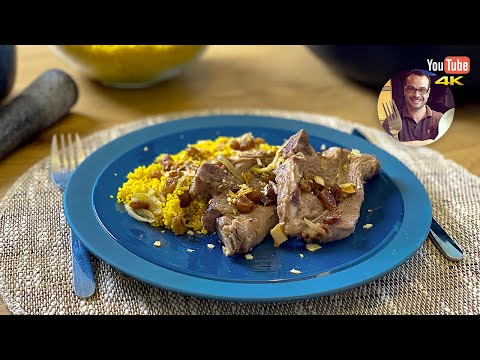 Lamb chops in a Dutch oven with couscous and toasted almonds