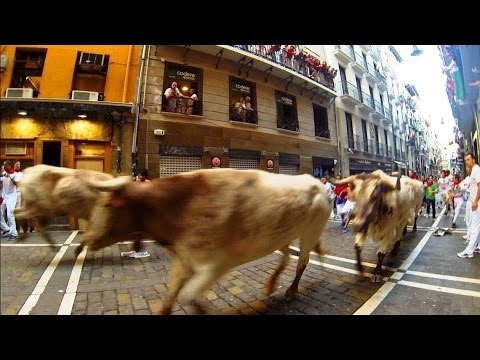 Watch Bull Almost Knock Itself Out Running Into Wall During Running Of The Bulls