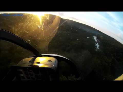 Bell 206b takeoff from river gravelbar