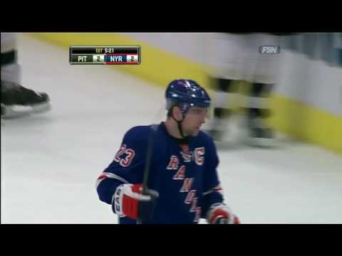 Chris Drury scores from his knees in front of the net