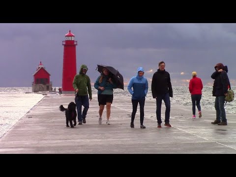 People Enjoy Wet Windy Day at Grand Haven Lighthouse and Pier 10-15-17