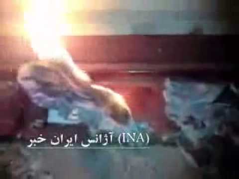 Khamenei pictures on Fire in Tehran - Iran 15 March 2010
