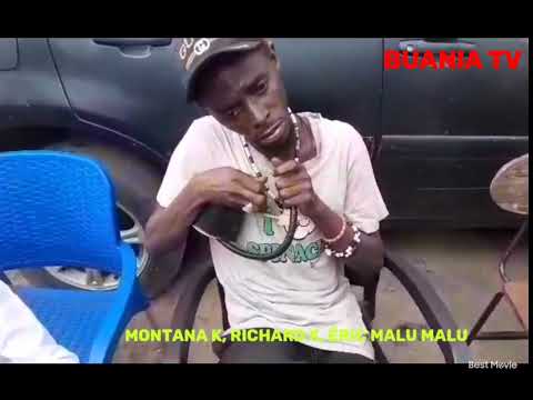 ROGER LANDU SATONGE DE STAFF BENDA BILILI AVEC SES ENFANTS GROUPE FAMILLES  SOUTENEZ LE PROJET