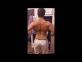 teen Natural Bodybuilder back flexing