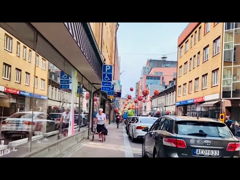 Swedish city walk: Norrköping. City streets to central station. Everyday life with street sound