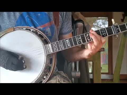 Don Reno's break to "Wall Around Your Heart" with and without the capo.