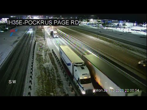 Vehicles travel carefully on Dallas roads as icy conditions continue