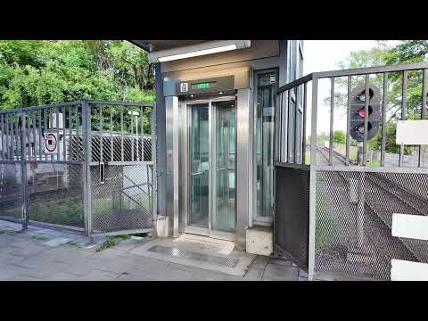 Sweden, Stockholm, Alvik Subway Station, 2X elevator - going down to platform level