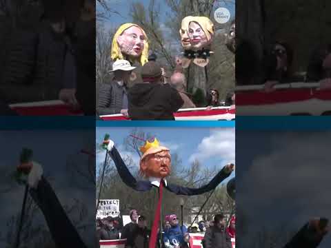 'No Kings' protesters carry Trump, cabinet puppets in Washington, DC
