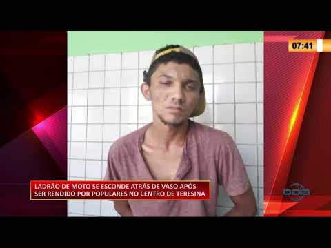 LadraÌƒo de moto se esconde apoÌs ser rendido por populares no centro de Teresina 14 09 2020