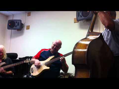 Rob Gourlay and John Repucci perform for Jim's bass class at Berklee