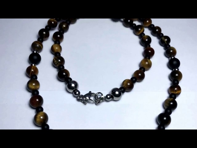 Vídeo relacionado con GAVU Collar Calavera Hombre, Collar en Y Rosario para hombre con Cuentas de Ónix Mate y Hematita con Colgante Calavera de Acero inoxidable