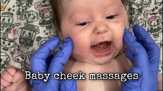 Baby cheek massages