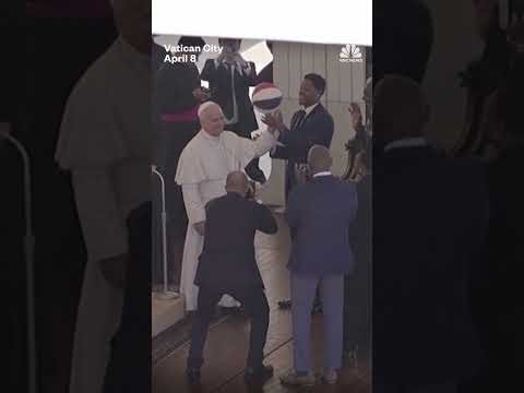 Pope Leo learns how to spin a ball on his finger