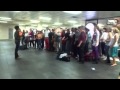 Выступление современного хора на станции метро 