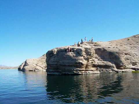 Cliff diving not far from the campground down the river