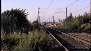 preview picture of video 'Pasadas de trenes al norte de Rancagua 03/03/1996 (Carguero con D-18001, AEL, AEZ, AM-23, E-30, E32)'