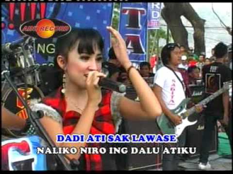 NYIDAM SARI Voc. Rina Amelia OM SAGITA