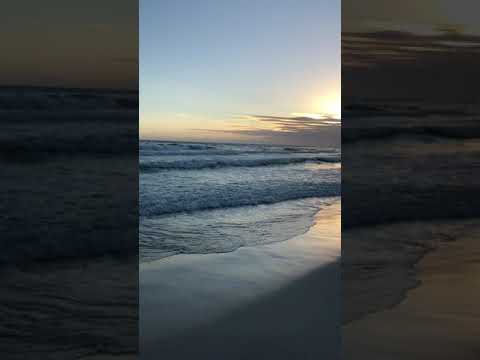 Sunset on the waves/beach video