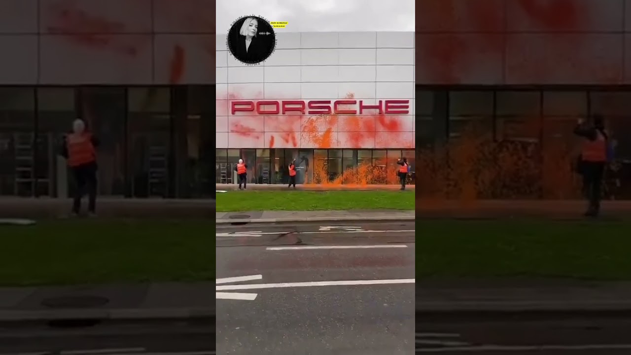 İsviçre’deki çevreci aktivistler, protesto amacıyla Porsche bayisini turuncuya boyadılar