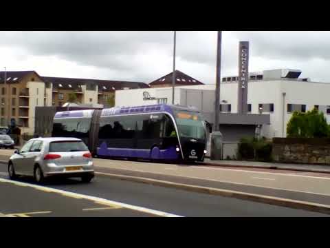 CAF train DMU & Vanhool bus Translink NI Railways & Translink GLIDER 4005 & 3218 at Lanyon Place.